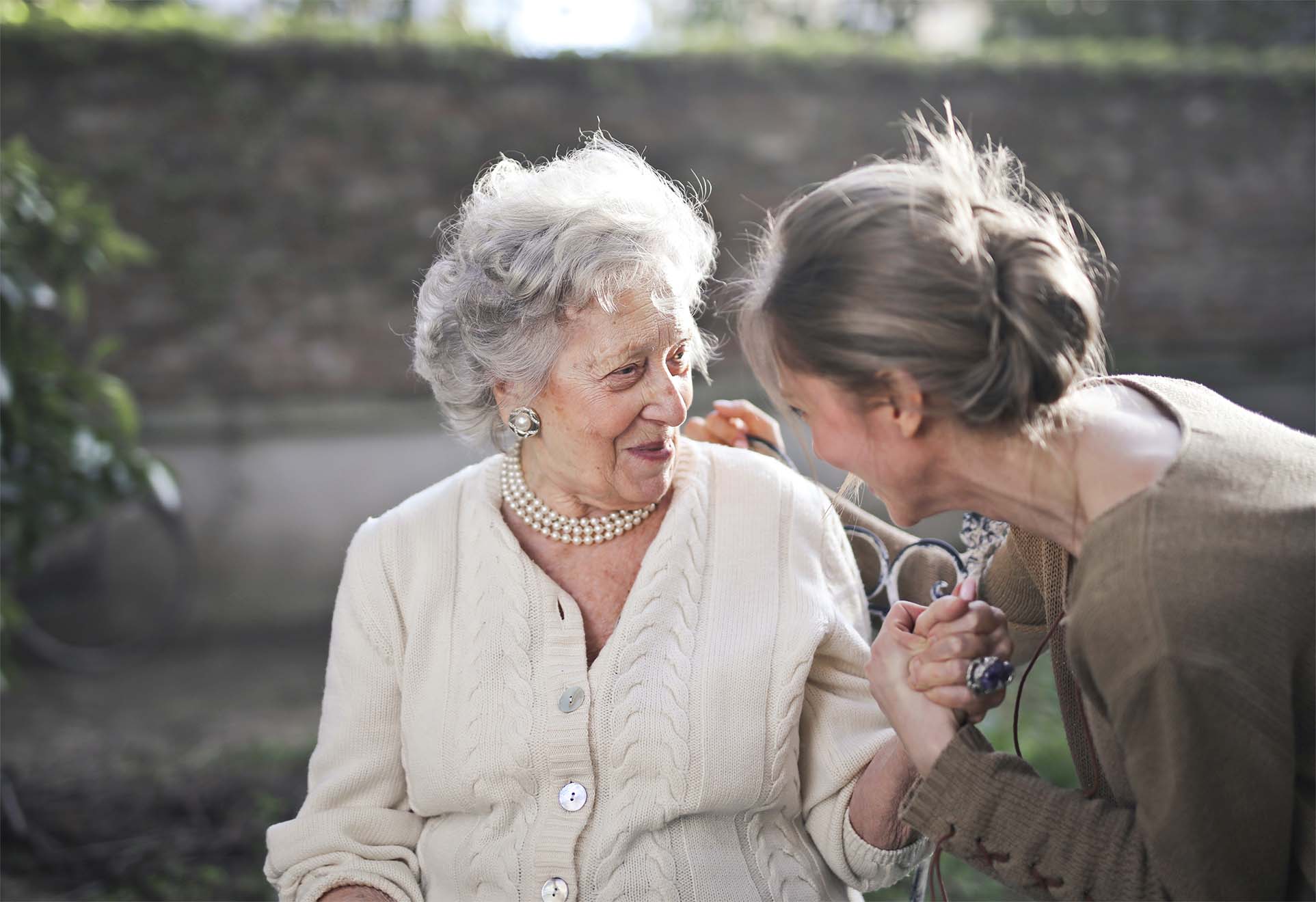 two ladies sat outside